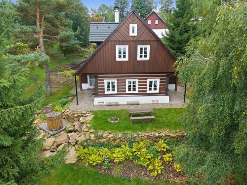 an aerial view of a house in the woods at Holiday Home Roubenka Maleč by Interhome in Strašín