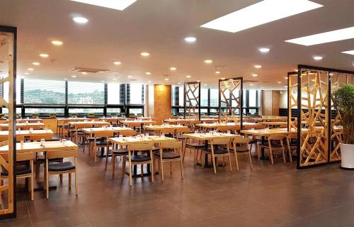 ห้องอาหารหรือที่รับประทานอาหารของ Hotel Skypark Kingstown Dongdaemun