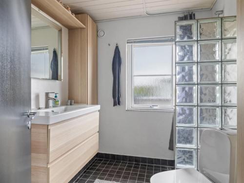 Koupelna v ubytování Holiday Home Elline - 200m from the sea by Interhome