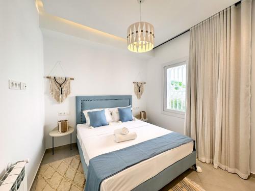 Postel nebo postele na pokoji v ubytování Rayhana Apartment 2 Bedrooms