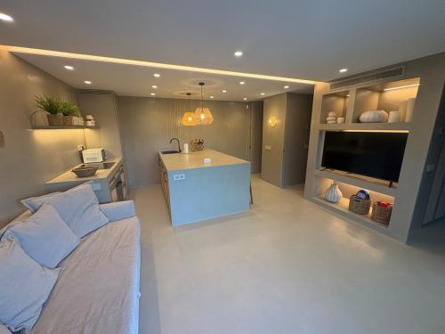 Precioso apartamento de playa con jardín privado