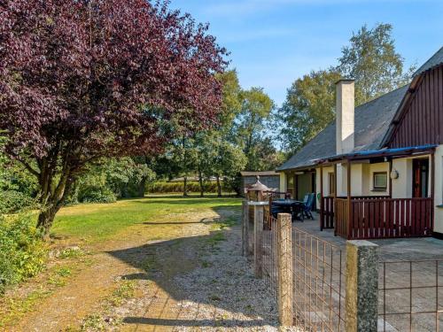 a house with a fence in front of it at Holiday Home Eiko - 400m to the fjord by Interhome in Storvorde