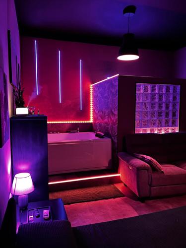 Posezení v ubytování SUITE PRIVATE SPA TownHouse Piraino