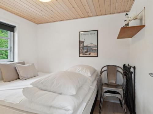 Ένα ή περισσότερα κρεβάτια σε δωμάτιο στο Holiday Home Veljan - 1-2km from the sea by Interhome
