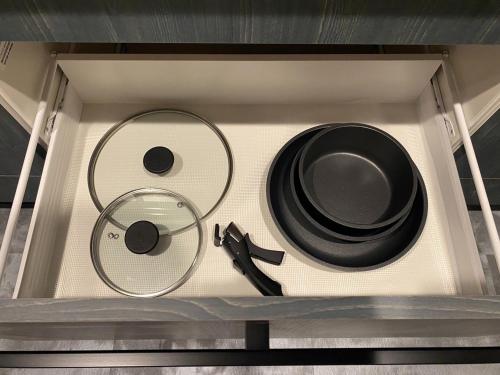 a drawer with two cdds and a knife at HIRARI Mizubenomori - Vacation STAY 08869v in Chikugo