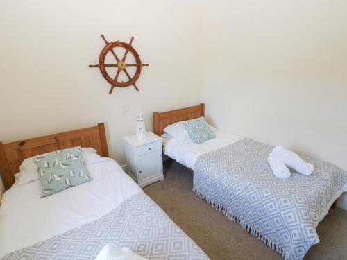 Ein Bett oder Betten in einem Zimmer der Unterkunft Hawthorns