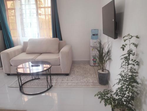 TV a/nebo společenská místnost v ubytování Tollo Homes