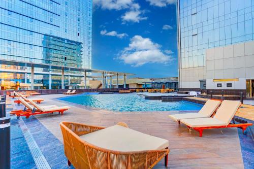 a pool on the roof of a building at Sunday Hotel & Residences Gurugram in Gurgaon