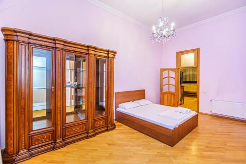 Säng eller sängar i ett rum på GMZA Apartment