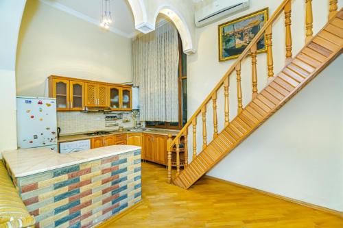 Ett kök eller pentry på GMZA Apartment
