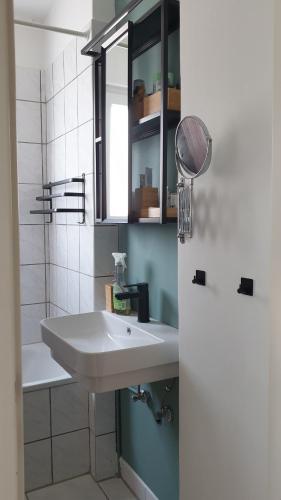 Ένα μπάνιο στο Ferienwohnung Bad Vilbel