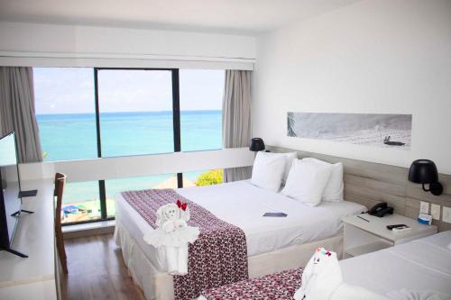 Katil atau katil-katil dalam bilik di Maceió Mar Hotel