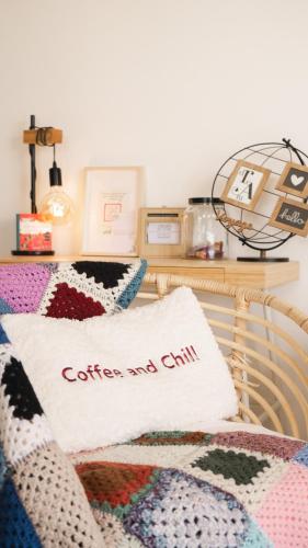 a basket with a pillow with the wordscoffee and my chill at Pâquerette in Arles