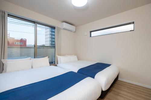 Bridge Stay Midoribashi - Spacious Stay in Higashinari, Easy Access for Osaka Sightseeing, Brand-New Opening in Higashi-Imazato Area, Sleeps up to 10 Guests