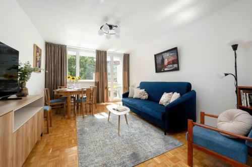 Blue Two Bedroom Apartment in Wrocław with Desk, Bathtub and Balcony by Noclegi Renters