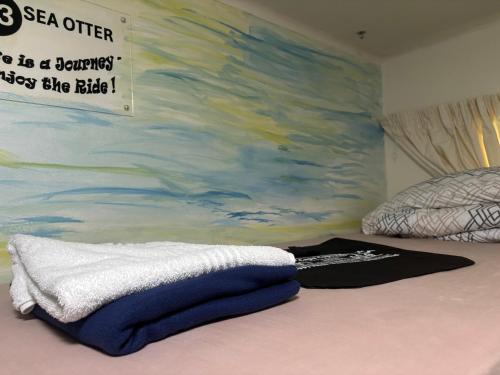 Postel nebo postele na pokoji v ubytování Cape Capsules