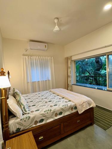Ένα ή περισσότερα κρεβάτια σε δωμάτιο στο Vagator Forest View