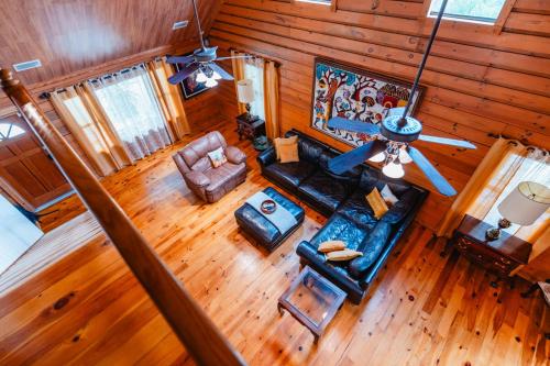 an overhead view of a living room in a cabin at Speedway Log Cabin in Sebring
