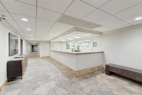 an empty office with a counter and a bench at Fallridge in Vail