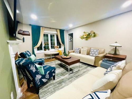 a living room with a couch and a table at Private Estate, Walk to Princeton Downtown, 3-Bedrooms 2-Bath with Free Parking in Princeton