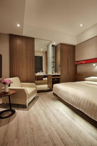 Postel nebo postele na pokoji v ubytování City Place Hotel