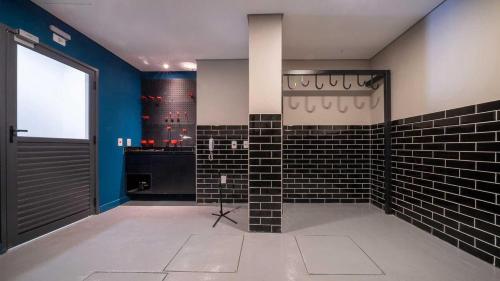 Et badeværelse på Studio Novo com Piscina e Metrô ao lado