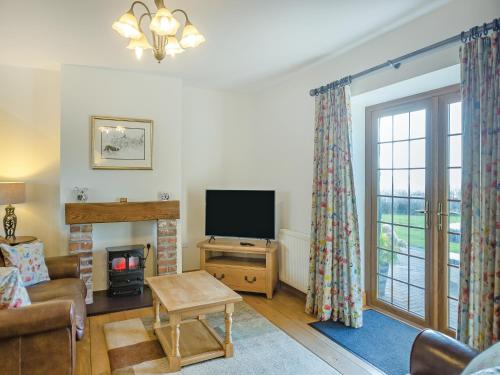 Et tv og/eller underholdning på Siambr Cottage - Uk48257