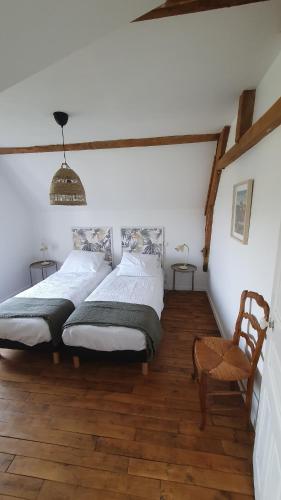 Llit o llits en una habitació de Maison Valentine