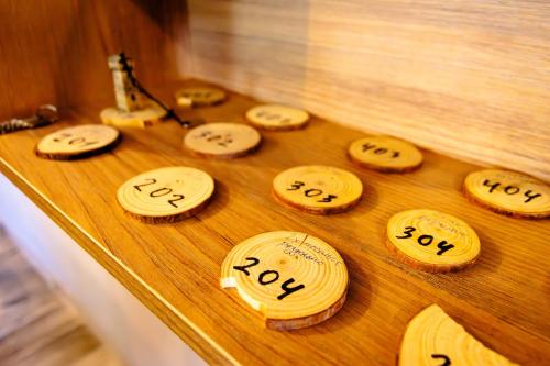 a group of wooden cookies on a wooden table at Mestia Roots in Mestia