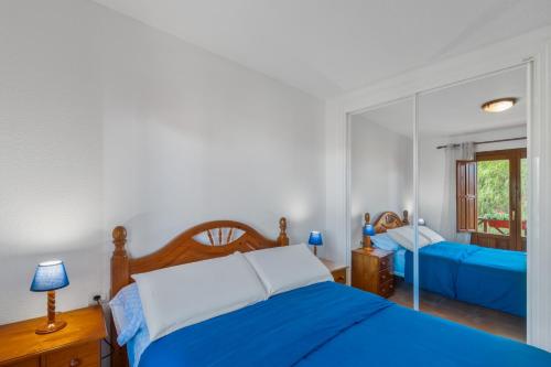Ένα ή περισσότερα κρεβάτια σε δωμάτιο στο Vv Los Balconcitos 32 Los Cancajos