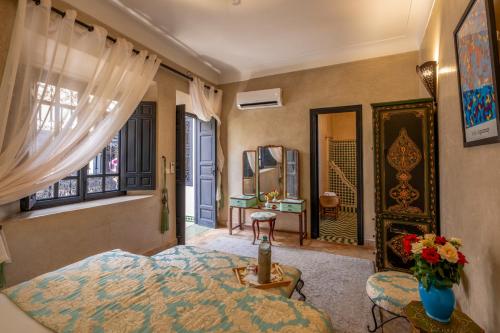 Ένα ή περισσότερα κρεβάτια σε δωμάτιο στο Riad Saba