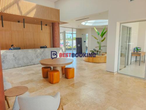 an office with a table and chairs and a counter at Santa Marina Luxury Stay - Ocean View in Estación El Salto