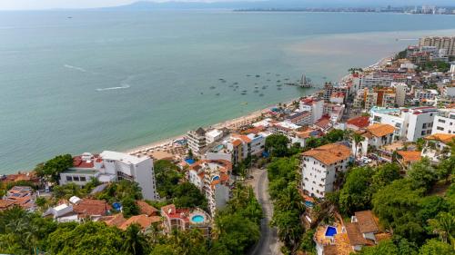an aerial view of a city and the ocean at Casa Carmen Zona Romantica, 2BD, 3 bath condo in Puerto Vallarta