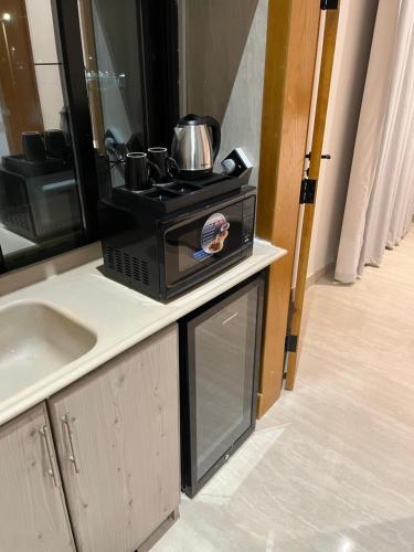 Dapur atau dapur kecil di Apartment with self check-in 52
