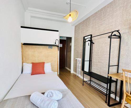 Letto o letti in una camera di Autentic Boutique Moncloa