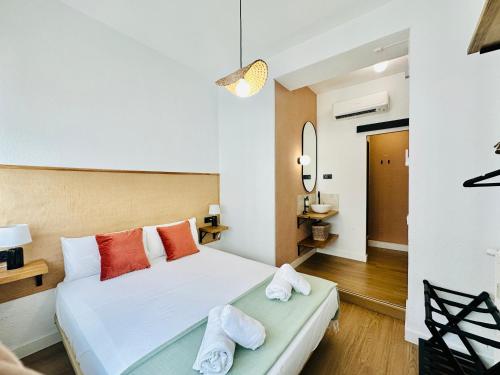 Letto o letti in una camera di Autentic Boutique Moncloa