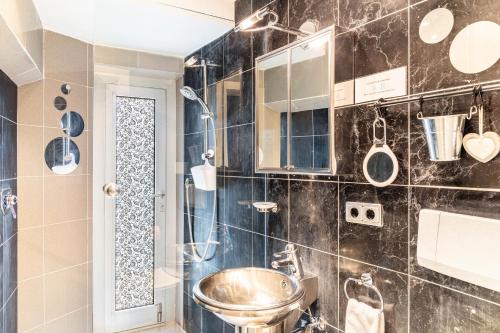 Ένα μπάνιο στο Ferienwohnung am Wehr