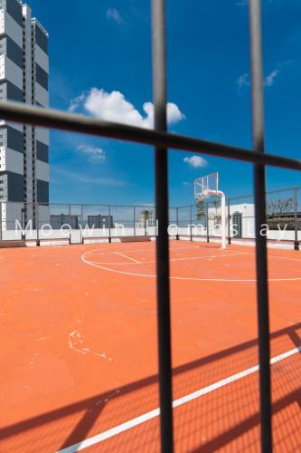a basketball court with a basketball hoop at Summer Cozy Studio Room in Perai