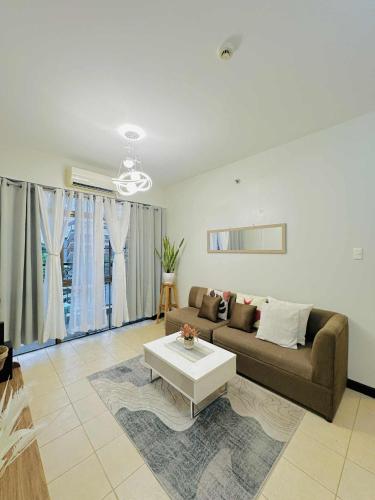 Posezení v ubytování Magallanes Residences Condominium 211&212B