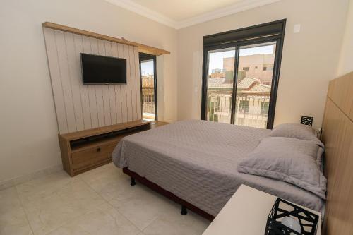 Llit o llits en una habitació de Unique Residence
