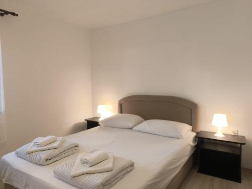 Postel nebo postele na pokoji v ubytování Apartment Davorka