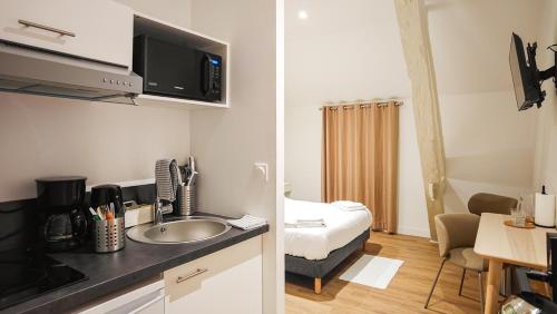 Dapur atau dapur kecil di l'Hôtel du Cerf - Vailly sur Sauldre - Grand Sancerrois