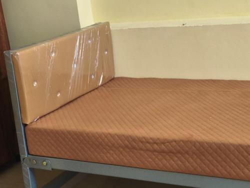 Postel nebo postele na pokoji v ubytování Vybe Hostel