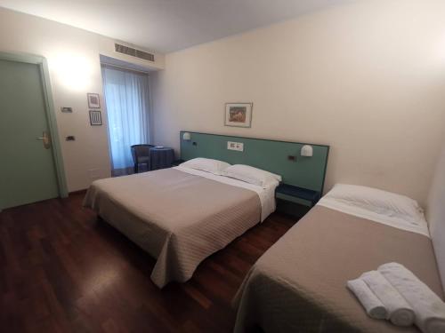 Postel nebo postele na pokoji v ubytování Deco Hotel