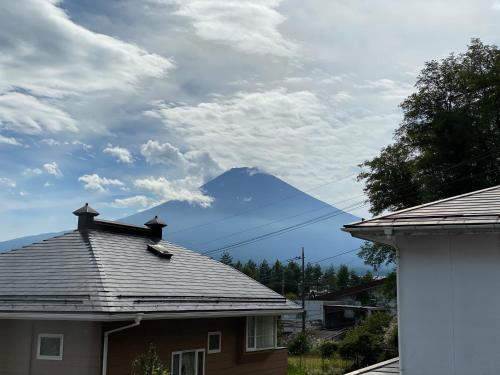 a mountain in the distance with a house at Vacation stay fujiyoshida in Fujiyoshida