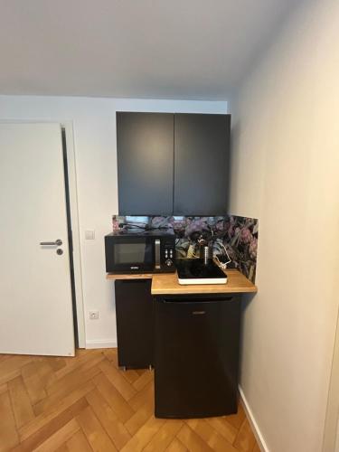 Η κουζίνα ή μικρή κουζίνα στο Private Zimmer mit eigener Küche und in Rheinnähe