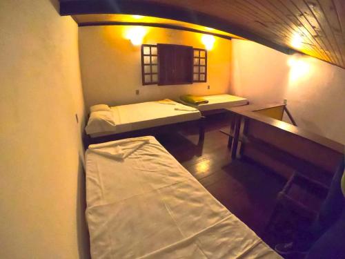 Katil atau katil-katil dalam bilik di Eco-Flats Cachoeira Azul