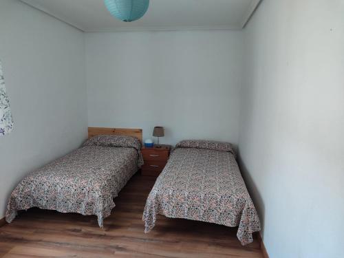 Acogedora habitación privada en piso familiar con baño compartido