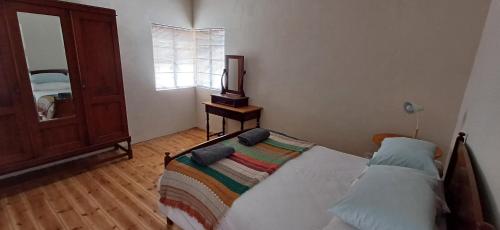 Cama o camas de una habitación en Scheepers Rust Guest Farmhouse