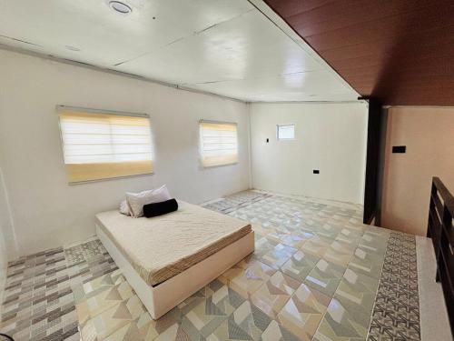 Postel nebo postele na pokoji v ubytování Casa PolTita Samal Island